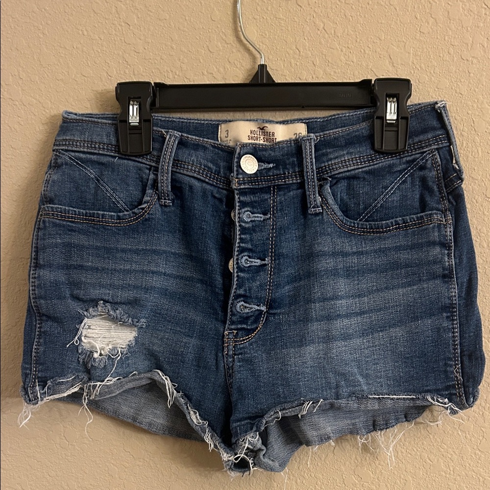 Hollister Women's Distressed Dark Blue Jean Shorts
High rise size W26